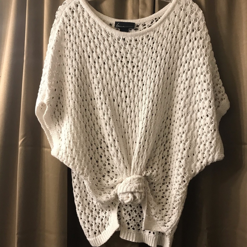 Bathing suit cover-up or Women’s heavy knit white capped sleeved shirt